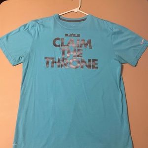 Light blue Nike LeBron James “claim the throne” graphic, dri-fit t-shirt